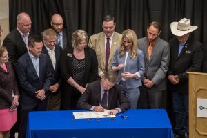 Governor Hickenlooper Signing Bill 2