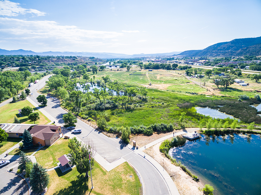 Aerial view of a park with lake.