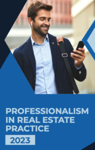 Smiling man with phone and earbuds.