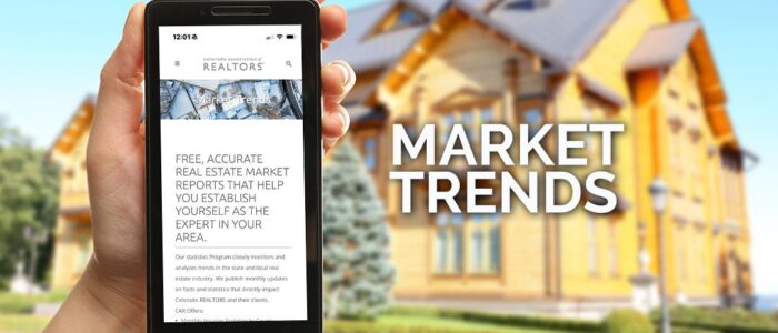 Smartphone displaying real estate market trends.
